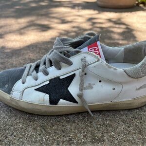 Golden Goose White and Black Vintage Sneakers